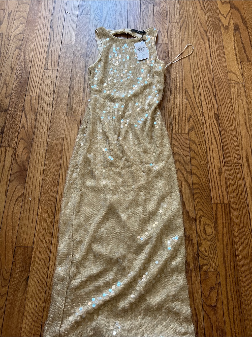 Mango Gold Sequin Maxi Dress
 Sleeveless, fitted silhouette, all-over sequin